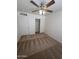 Bedroom with a ceiling fan and neutral carpet at 13004 W Saint Moritz Ln, El Mirage, AZ 85335