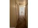Hallway with tile flooring leading to other rooms at 13004 W Saint Moritz Ln, El Mirage, AZ 85335