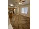 Well-lit kitchen with tile floors, pantry, modern appliances and an adjacent dining space at 13004 W Saint Moritz Ln, El Mirage, AZ 85335