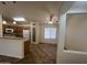 Inviting eat-in kitchen with tile flooring, breakfast bar, and modern appliances at 13004 W Saint Moritz Ln, El Mirage, AZ 85335
