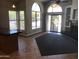 Bright living room with large windows, neutral colors, and fireplace perfect for entertaining at 1502 E Estrid Ave, Phoenix, AZ 85022