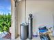 Garage interior view with a water softener unit and storage at 15377 W Catalina Ct, Goodyear, AZ 85395