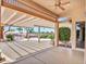A large covered patio is perfect for entertaining and relaxing with an outdoor view of the golf course at 15377 W Catalina Ct, Goodyear, AZ 85395