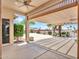 Covered patio view showcasing outdoor living space with views of the fenced-in yard and landscaping at 15377 W Catalina Ct, Goodyear, AZ 85395