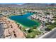 Gorgeous community aerial showcasing lakefront homes and meticulous desert landscaping at 16250 S 13Th St, Phoenix, AZ 85048