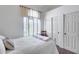 Bright bedroom with white walls, shutters, and a large closet for ample storage at 16250 S 13Th St, Phoenix, AZ 85048