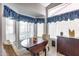 Bright breakfast nook featuring a drop-leaf table, patterned chairs, and natural light at 16250 S 13Th St, Phoenix, AZ 85048