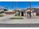 Charming single-story home featuring manicured landscaping and a tile roof at 16250 S 13Th St, Phoenix, AZ 85048