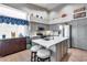 Kitchen featuring a central island, stainless steel appliances, and an open layout at 16250 S 13Th St, Phoenix, AZ 85048