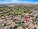 Aerial view of the residential community with mountain views, green spaces, and neighborhood amenities at 16559 W Lincoln St, Goodyear, AZ 85338