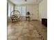 A bright entryway features decorative floor tiles, light walls, and neutral-colored furniture at 16559 W Lincoln St, Goodyear, AZ 85338