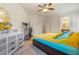 Comfortable main bedroom featuring an ensuite bathroom and ample natural light at 16559 W Lincoln St, Goodyear, AZ 85338
