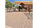 Fun playground featuring a covered play structure, swings, and climbing area for children at 16559 W Lincoln St, Goodyear, AZ 85338