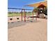 Enjoy a neighborhood park with swings, slides, and climbing wall at 16559 W Lincoln St, Goodyear, AZ 85338