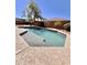 Inviting swimming pool with shallow steps and cool, clear water, perfect for enjoying sunny days at 16559 W Lincoln St, Goodyear, AZ 85338