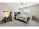 Bright bedroom featuring a dinosaur theme, neutral walls, and a comfortable-looking bed at 1718 E Harwell Rd, Phoenix, AZ 85042