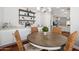 Bright dining area features a stylish table set and modern shelving at 1718 E Harwell Rd, Phoenix, AZ 85042