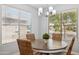 Bright dining area features a stylish table set and natural light at 1718 E Harwell Rd, Phoenix, AZ 85042