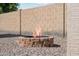 Outdoor fire pit with brick surround, perfect for backyard gatherings at 1718 E Harwell Rd, Phoenix, AZ 85042