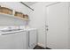 Efficient laundry room with a modern washer and dryer at 1718 E Harwell Rd, Phoenix, AZ 85042