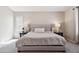 Comfortable main bedroom with plush carpeting and neutral colors at 1718 E Harwell Rd, Phoenix, AZ 85042