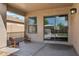 Covered patio with comfortable seating and a view of the backyard at 1718 E Harwell Rd, Phoenix, AZ 85042
