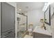 Updated bathroom with a glass-enclosed shower, modern vanity, and sleek fixtures at 17441 N Del Webb Blvd, Sun City, AZ 85373
