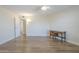 Bright bedroom features wood floors, a ceiling fan, and a cute writing desk at 17441 N Del Webb Blvd, Sun City, AZ 85373