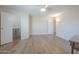 Bright bedroom features wood floors and a ceiling fan with bright trim at 17441 N Del Webb Blvd, Sun City, AZ 85373