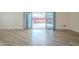 Bright, open living space featuring a sliding glass door with views of the backyard at 17441 N Del Webb Blvd, Sun City, AZ 85373