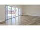 Bright living area with sliding glass doors leading to a private patio at 17441 N Del Webb Blvd, Sun City, AZ 85373