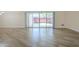 Open-concept living space with sliding glass doors and ample natural light at 17441 N Del Webb Blvd, Sun City, AZ 85373