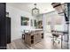 Creative studio space with custom workbench, ample natural light, and direct access to the outdoors at 17664 W Marshall Ln, Surprise, AZ 85388
