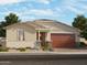Charming single-story home featuring a landscaped front yard and attached two-car garage at 17828 W Pierson St, Goodyear, AZ 85395
