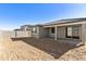 New construction home with desert landscaping and a covered patio with a view of the block wall at 19028 W Rose Ln, Waddell, AZ 85355