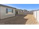 New home with desert landscaping and views of mountains from the backyard at 19028 W Rose Ln, Waddell, AZ 85355