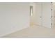 Minimal bedroom with neutral carpet and access to closet and additional rooms at 19028 W Rose Ln, Waddell, AZ 85355