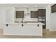 Modern kitchen with stainless steel appliances, stylish countertops, and ample storage space at 19028 W Rose Ln, Waddell, AZ 85355