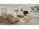Inviting living room featuring neutral tones and contemporary furnishings, complete with an open layout at 19028 W Rose Ln, Waddell, AZ 85355