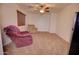 Spacious living area with neutral walls, plush carpet, and a cozy atmosphere at 2008 N Pablo Ct, Casa Grande, AZ 85122