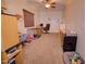 Neutral bedroom with a ceiling fan and dog crates, offering comfortable space at 2008 N Pablo Ct, Casa Grande, AZ 85122