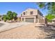 Beautiful two-story home with desert landscaping, two car garage, and well kept lawn at 2008 N Pablo Ct, Casa Grande, AZ 85122