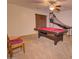 Spacious game room with a pool table and natural light, great for entertainment at 2008 N Pablo Ct, Casa Grande, AZ 85122