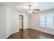 Bedroom features include a ceiling fan, light, and window with shutters at 2025 E Campbell Ave # 143, Phoenix, AZ 85016