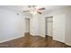 Bedroom with ceiling fan and large closet at 2025 E Campbell Ave # 143, Phoenix, AZ 85016