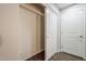 Walk in closet with clothes rack and door at 2025 E Campbell Ave # 143, Phoenix, AZ 85016