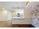 Modern kitchen with white cabinetry, granite countertops, and stainless steel appliances at 2025 E Campbell Ave # 143, Phoenix, AZ 85016