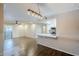 Bright open-concept with dining room, kitchen, and sliding doors to outside patio at 2025 E Campbell Ave # 143, Phoenix, AZ 85016