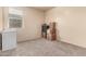 Simple bedroom with a window, a mini fridge, and many cardboard boxes at 2176 W Larissa Ln, San Tan Valley, AZ 85144