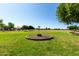 Community disc golf on a well-maintained green offers outdoor recreation and a visually appealing community space at 2176 W Larissa Ln, San Tan Valley, AZ 85144